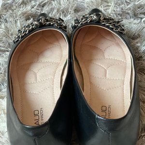 Black leather flats with silver bow tie